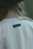 Luźny t-shirt dziecięcy Czarownica Masełkowa – DEAR SOPHIE – ujęcie 9